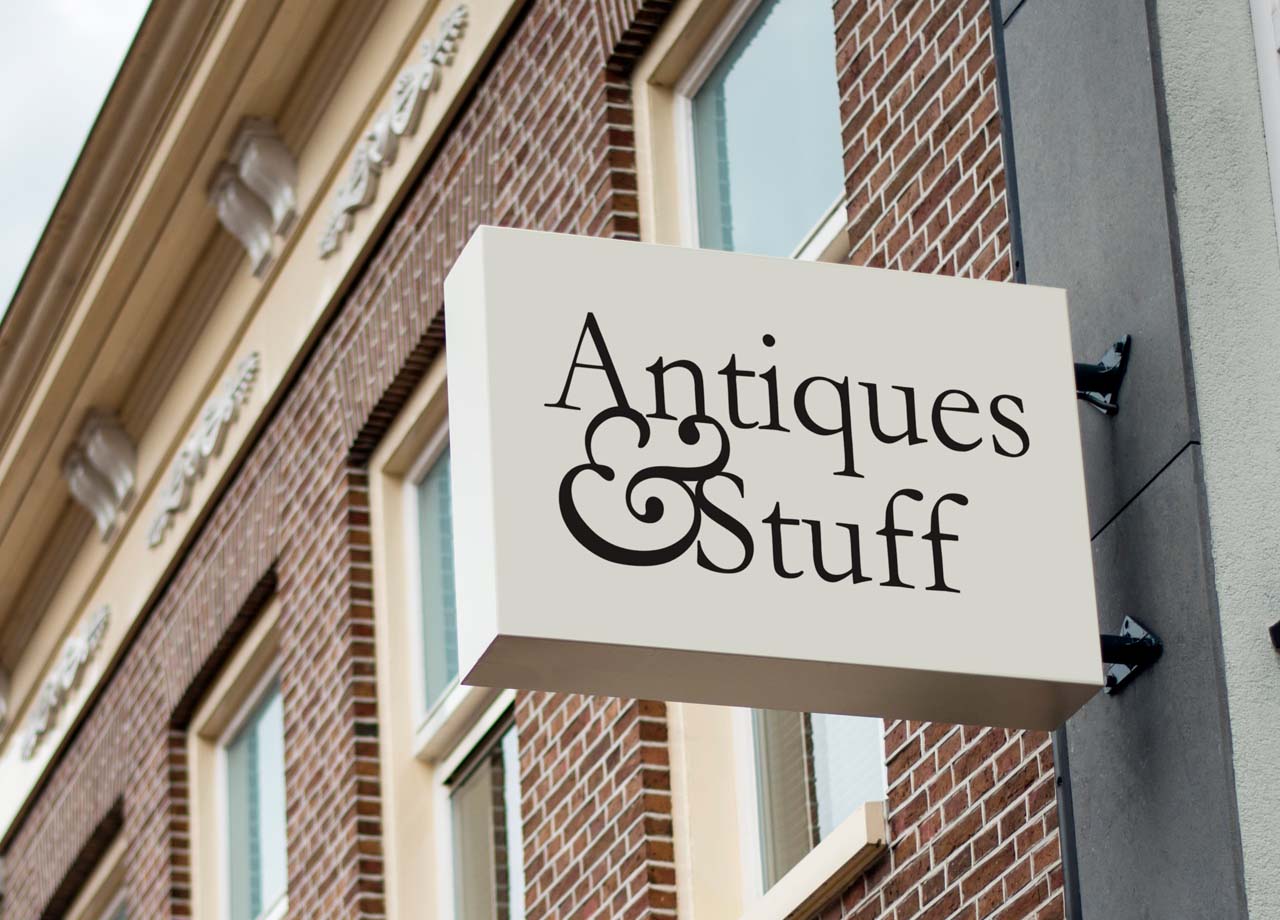 Antiques & Stuff Branding on sign outside of a building